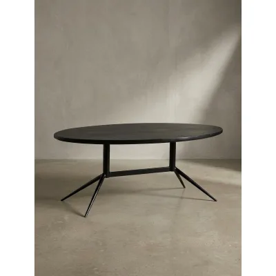 Couchtisch Oval in Schwarz aus Mango Massivholz und Metall, 90x50x35 cm mit natürlicher Holzmaserung